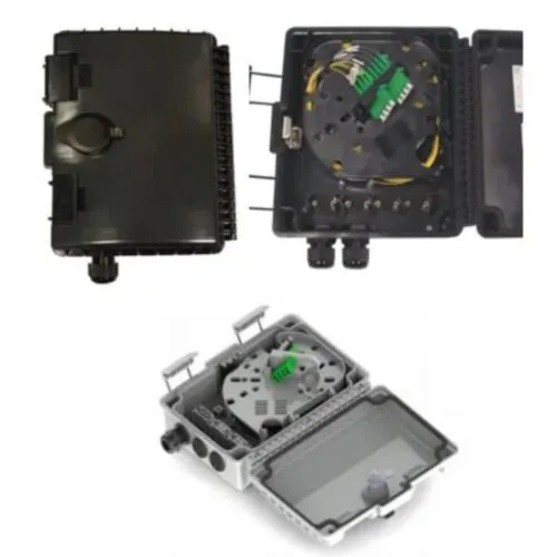 Black wall-mount fiber termination boxes, one open to show splice trays and green SC/APC adapters, beside a grey enclosure with a splitter.