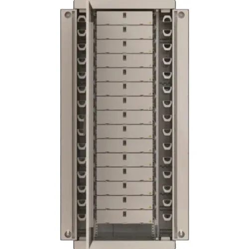 Tall indoor fiber frame with stacked termination modules and vertical cable management on both sides.